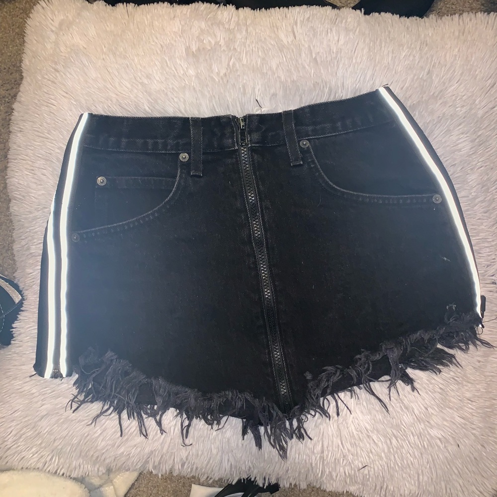 Black mini skirt with reflective side details